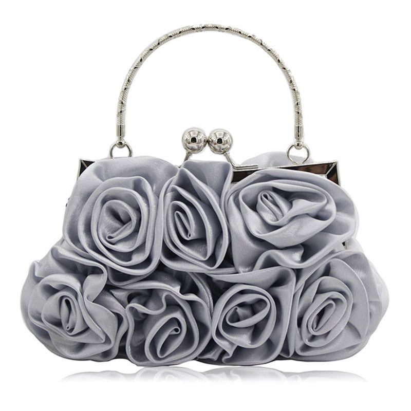 Satin flower clutch bag
