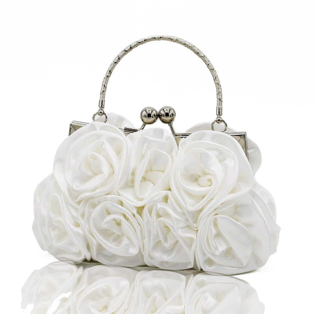 Satin flower clutch bag