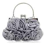 Satin flower clutch bag