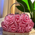 Satin flower clutch bag